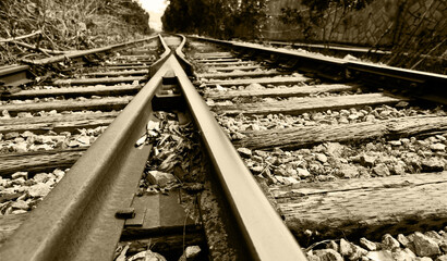 Fototapeta na wymiar Two railway tracks merge together