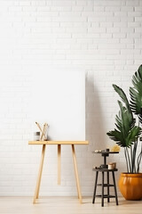 Blank White Mockup Frame in a Dynamic Art Studio Setting: Unleashing Creative Potential