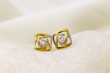 Gold earring studs with diamonds