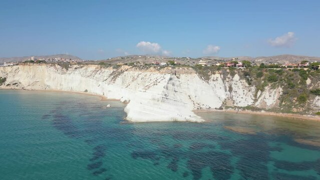 This aerial drone video shows the beautiful coastline of the Turkish Stairs, also named Scala dei Turchi. This natural wonder can be found at the coast of Sicily, southern Italy.