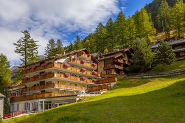 Fototapeta na wymiar Zermatt, alpine village, Switzerland, Swiss Alps colorful autumn panorama, houses and trees