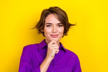 Photo portrait of lovely young lady thoughtful touch chin dressed stylish purple smart casual garment isolated on yellow color background