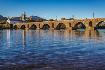 Naklejka premium Roman bridge in Ponte de Lima town in historical Minho Province, Portugal