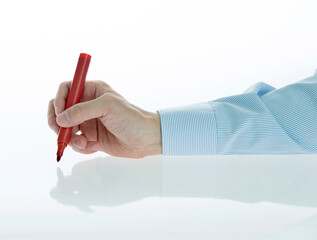 Businessman hand holding a pen on white background