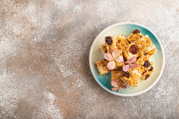 Traditional candy nougat with nuts and sesame, top view, copy space.