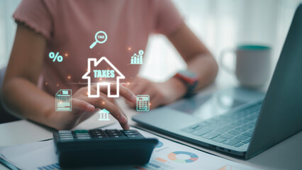 Property Tax Concept. business, businesswoman calculate property tax.