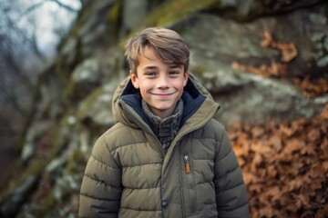 Lifestyle portrait photography of a happy boy in his 30s wearing a cozy winter coat against a serene rock garden background. With generative AI technology