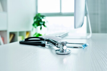 Doctor workplace with a stethoscope at table