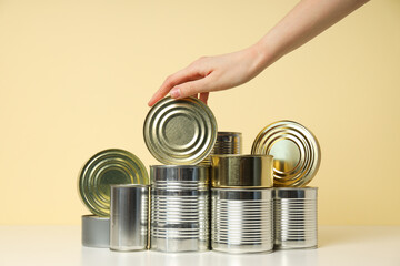 Canned food in blank metal jars, concept of canned food