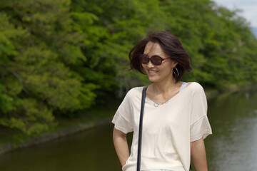 Middle aged Japanese woman with sunglasses