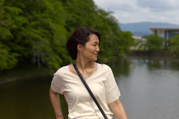 Middle aged Japanese woman outdoors