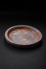 Empty wooden plate, knife, fork and cutting board