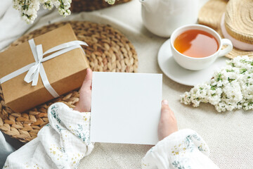 Postcard in hands with place for your text