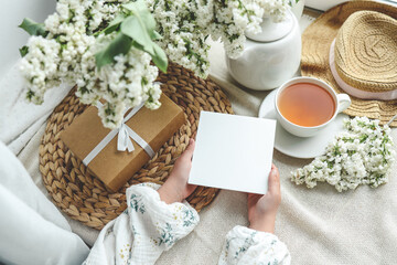 Postcard in hands with place for your text