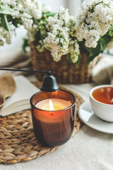 Candle extinguishing tool in hand, aesthetics