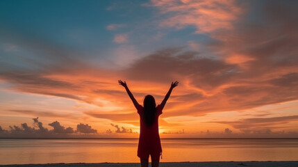 Fototapeta na wymiar Happy woman silhouette in the sunset