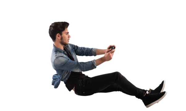 Young  man with game controller plays with a video game