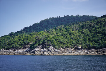 Fototapeta premium Sailing the sea. Seascape with rocks at blue sea. Travel by Thailand.