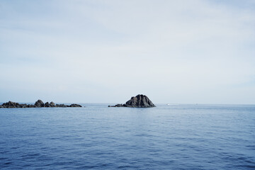 Sailing the sea. Seascape with rocks at blue sea. Travel by Thailand.