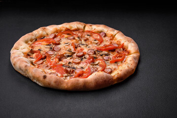 Bavarian pizza with smoked sausages, tomatoes, cheese, salt and spices