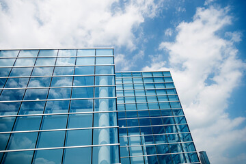 Part of modern business building against blue sky