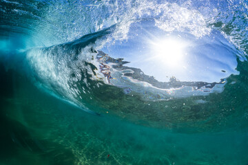 underwater scene of a crashing wave