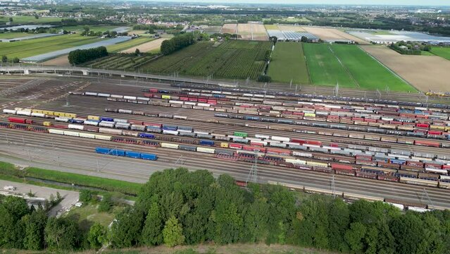 Aerial drone video of a shunting yard with freight trains in the Netherlands