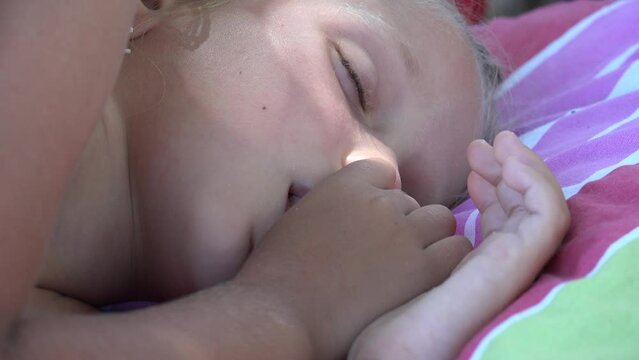 4K Face of a Child, Little Girl Sleeping, Sleepy Kid Sucking Thumb, Finger