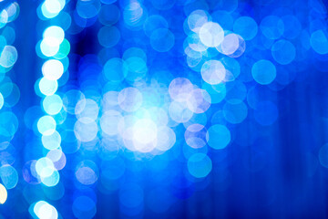 Defocused lights with white and blue bokeh for Christmas background