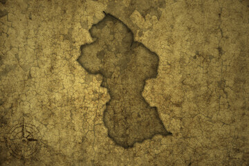 Fototapeta na wymiar map of guyana on a old vintage crack paper background .