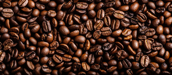 Obraz premium Coffee beans. Panoramic horizontal background of roasted aromatic coffee beans. Generative AI illustration.
