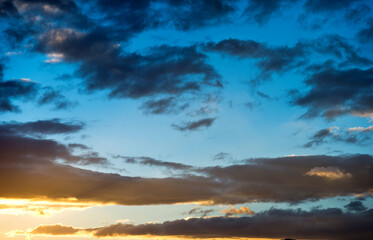 Naklejka na ściany i meble Beautiful sunset sky with clouds