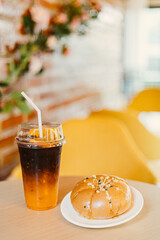 An orange coffee and Korean Cream Cheese Garlic Bread