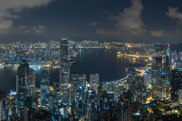 Scenery of Victoria harbor of Hong Kong city after midnight