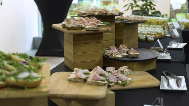 Open-face sandwiches on a counter as part of catering - closeup