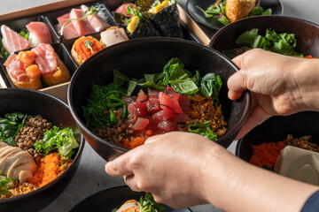 Soft tofu, shrimp, poke, avocado, temaki, raw tuna, salmon sashimi