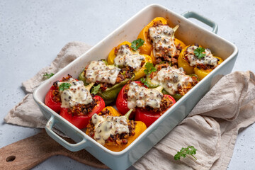 Colorful peppers stuffed with meat, bulgur and cheese