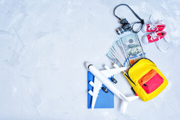 Vibrant Backpack with Cash, Plane Model and Accessories