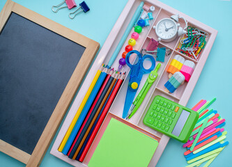Stylish colored stationery and school supplies in the organizer. Creative organization of stationery storage. concept Back to school.