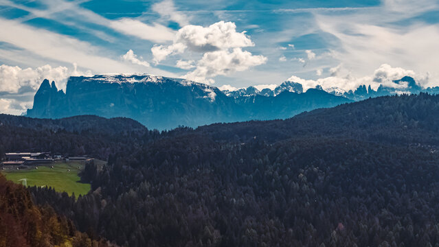 Alpine spring view with Mount Rosengarten and Mount Schlern seen from Mount Ritten, Oberbozen, Bozen, Dolomites, South Tyrol, Italy