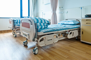 Empty bed in hospital ward