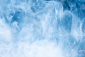 Fototapeta na wymiar white smoke on black background