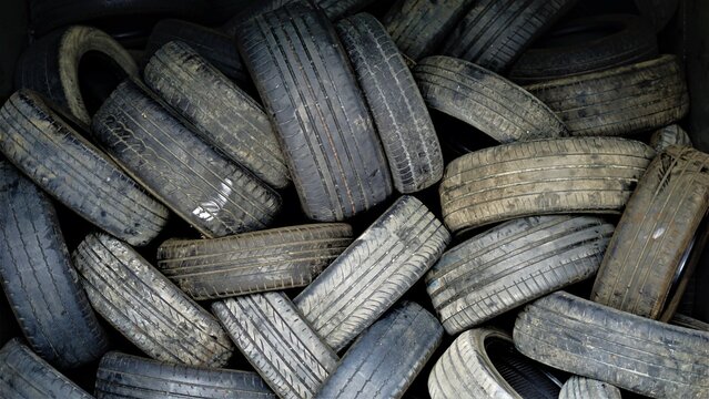 disused tires stacked as background
