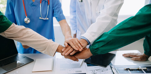 Team Doctors nurses union coordinate hands Teamwork Concept in hospital for success and trust in the team.