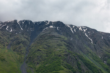 Obraz premium Beautiful Georgian Landscap,the Greater Caucasus mountains,Stepantsminda town,Georgia. 
