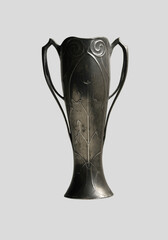 Pewter vase in art nouveau style with mistletoe decorations. 