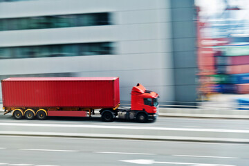Obraz na płótnie Canvas Container truck motion blur on highway overpass