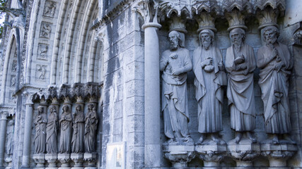 Sculptures of the apostles on the facade of the Anglican Cathedral in Cork, Ireland. Saint Fin Barre's Cathedral
