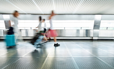 Fototapeta na wymiar Tourist with suitcase walking on footbridge