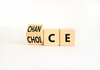 Choice and chance symbol. Businessman turns wooden cubes and changes the word Choice to Chance. Beautiful white table white background. Business choice and chance concept. Copy space.